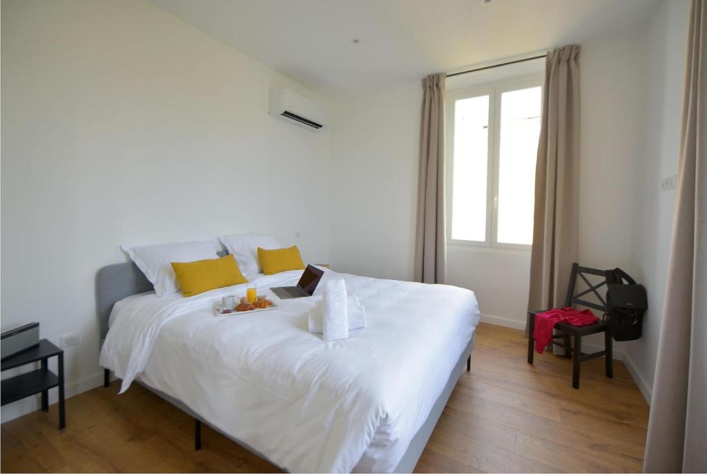 Posteľ alebo postele v izbe v ubytovaní Hôtel Continental