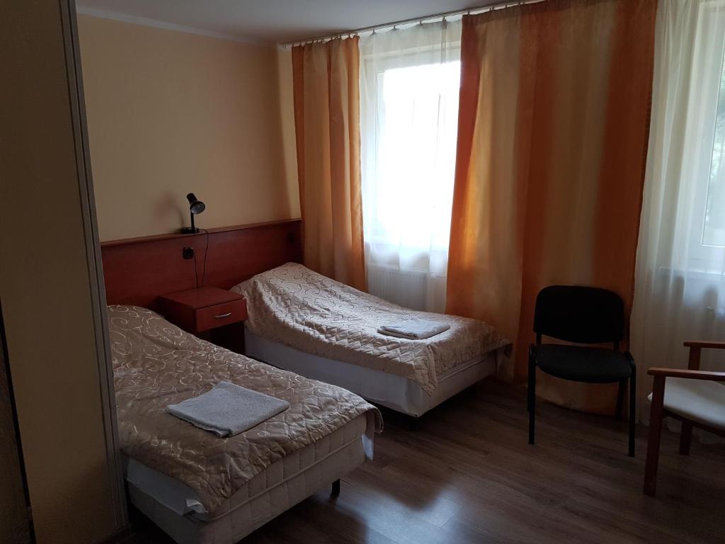 Posteľ alebo postele v izbe v ubytovaní Ośrodek SUDETY