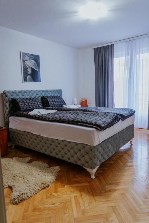 Postel nebo postele na pokoji v ubytování Apartman David