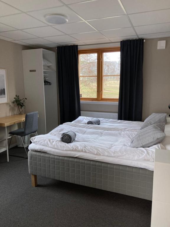 Postel nebo postele na pokoji v ubytování Morlanda B&B