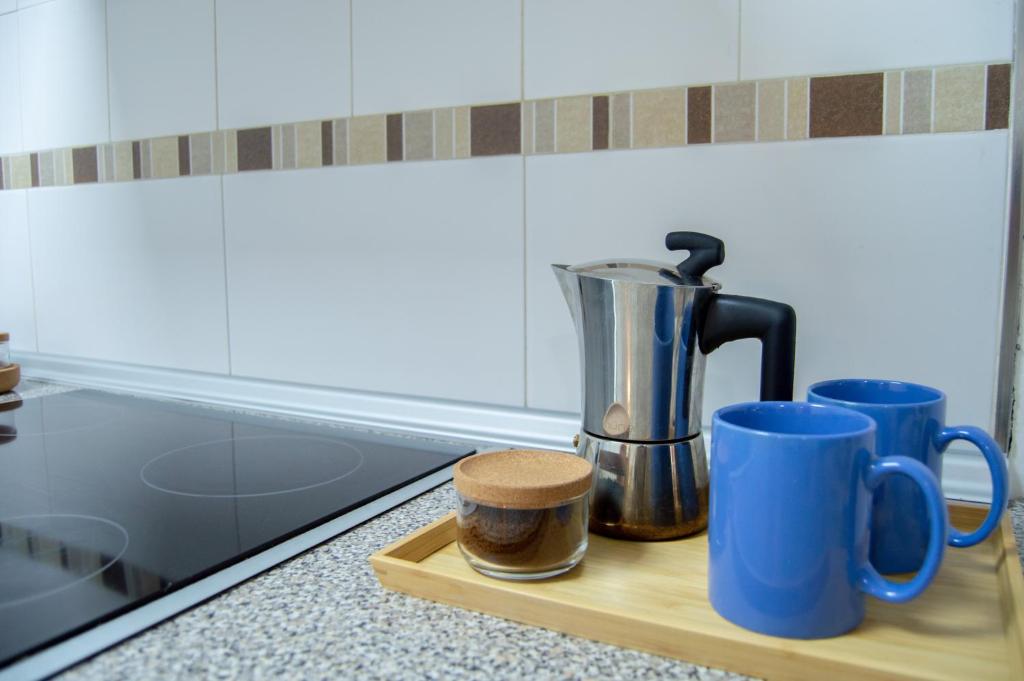 Príslušenstvo na prípravu kávy alebo čaju v ubytovaní Novam Apartament