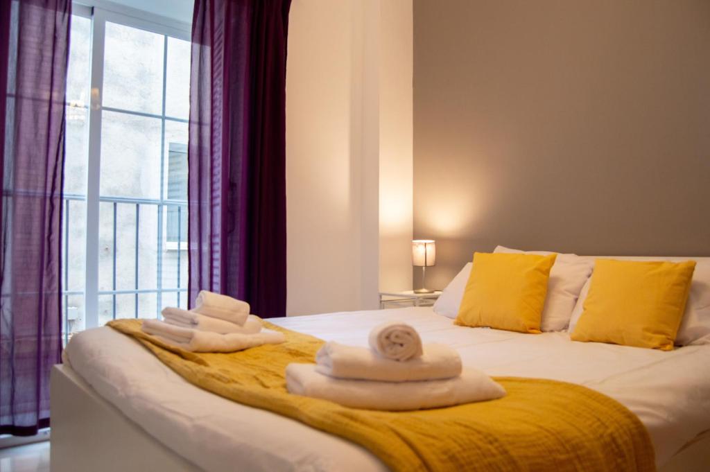 Posteľ alebo postele v izbe v ubytovaní Novam Apartament