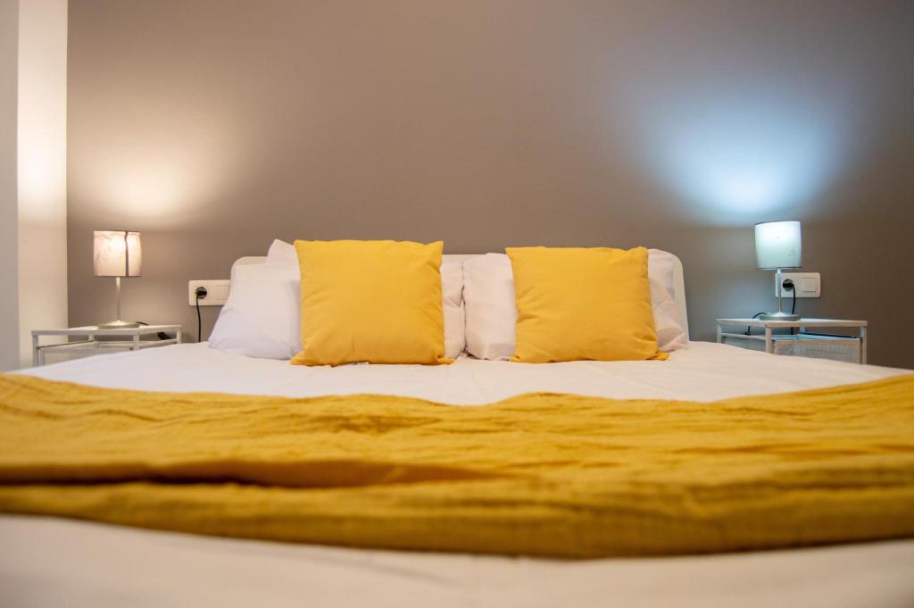 Posteľ alebo postele v izbe v ubytovaní Novam Apartament