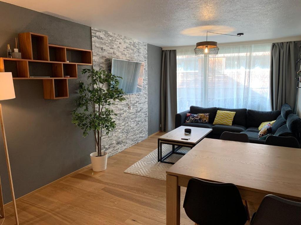 Posezení v ubytování Modern and comfortable apartment with sauna!