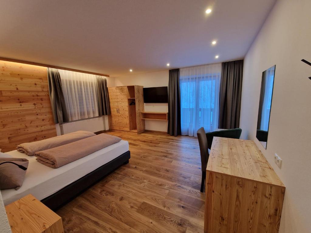 Voodi või voodid majutusasutuse Hotel Mignon toas