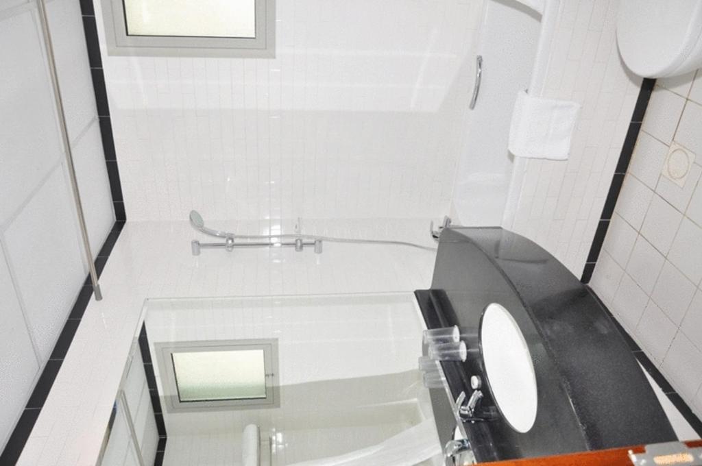 Koupelna v ubytování Akas-Inn Hotel Apartment
