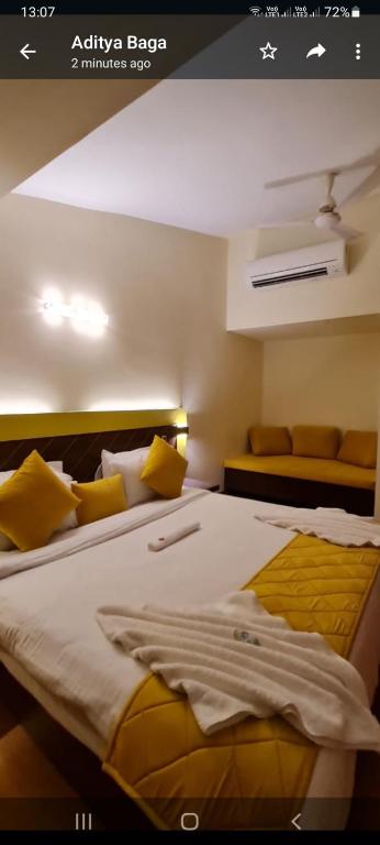 Postel nebo postele na pokoji v ubytování Ronaldos Hotel & Restaurants Baga