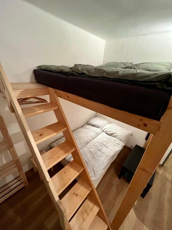 Postel nebo postele na pokoji v ubytování O Tom Nevim
