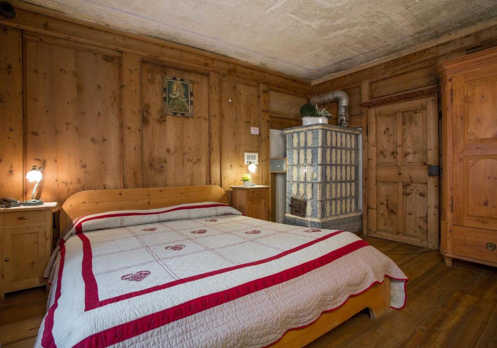 Postel nebo postele na pokoji v ubytování Historic Hotel Ristorante La Stua