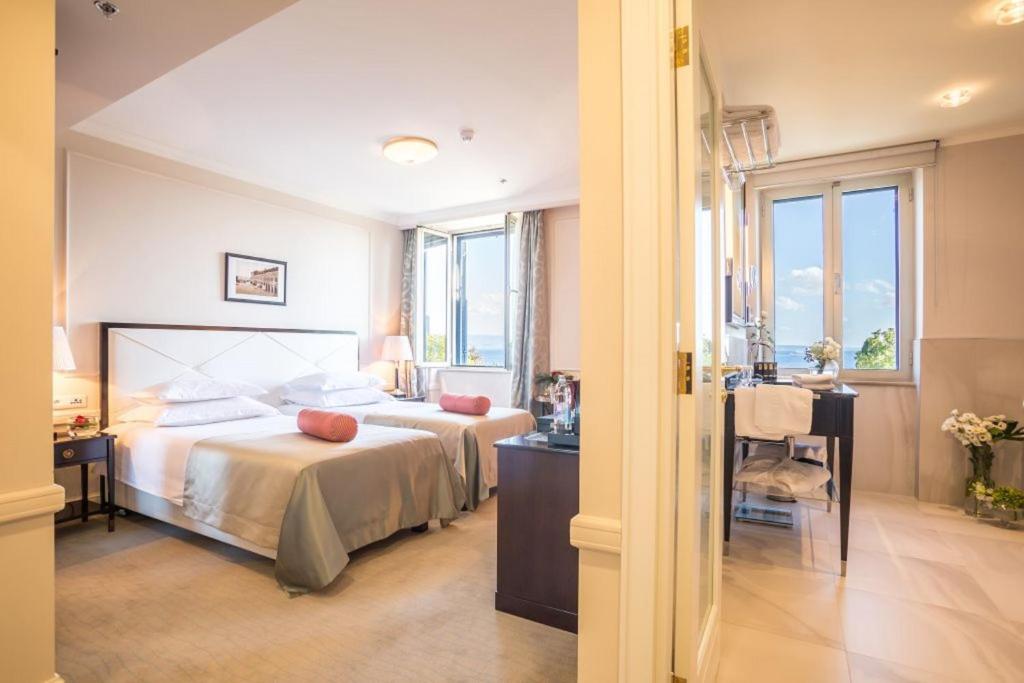 Postel nebo postele na pokoji v ubytování Hotel Park Split