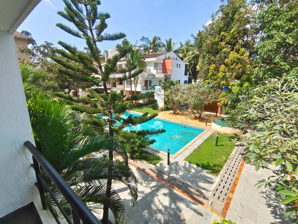 Бассейн в VILLA M - SOLITUDE 1 CANDOLIM GOA 3BHK, Pool Facing, Near Beach, Free Breakfast, Free WIFI and Prime Location или поблизости