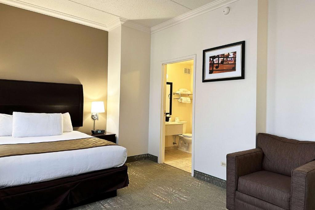 Postel nebo postele na pokoji v ubytování Chicago South Loop Hotel