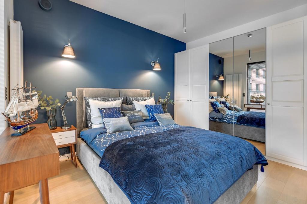 Posteľ alebo postele v izbe v ubytovaní Granaria Comfort Apartments