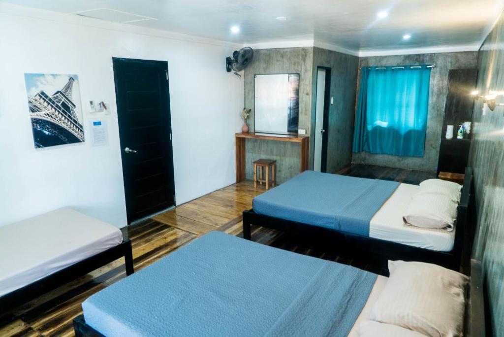 Postel nebo postele na pokoji v ubytování OKEANOS HOTEL