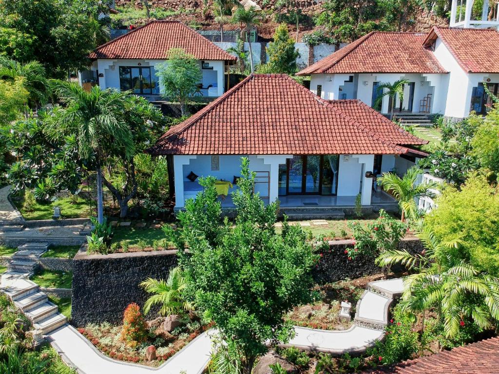 an aerial view of a house with a garden at Anda Amed Villas & Spa in Amed