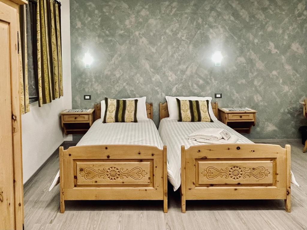 Postel nebo postele na pokoji v ubytování B&B L'Aigual