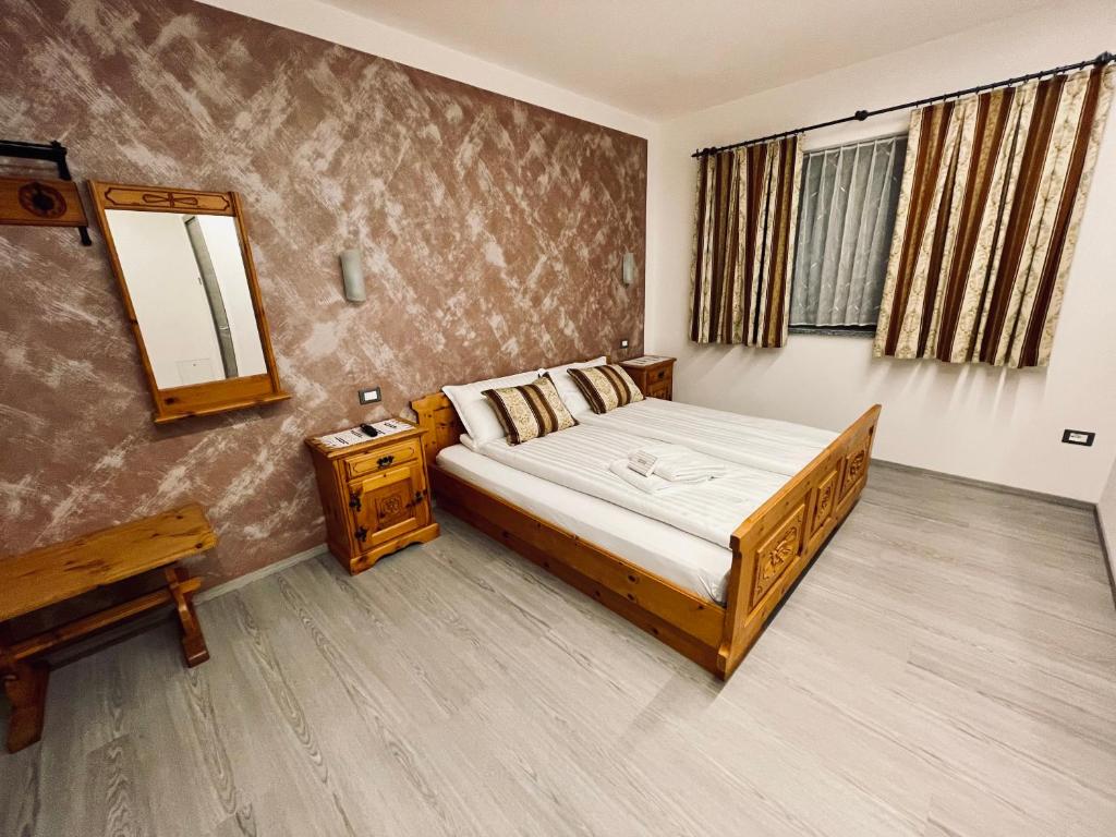 Postel nebo postele na pokoji v ubytování B&B L'Aigual
