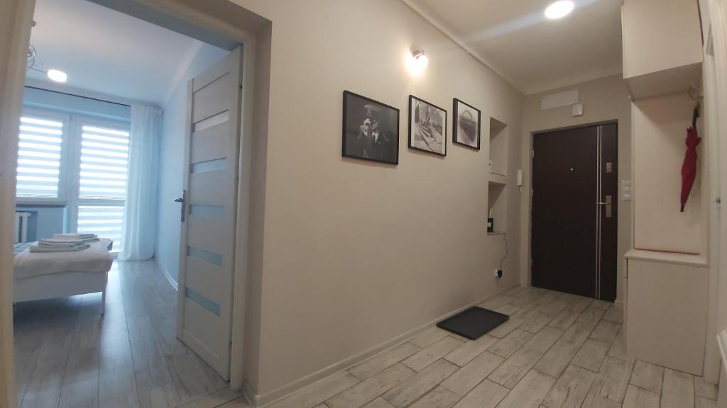 Posteľ alebo postele v izbe v ubytovaní Apartament w Centrum