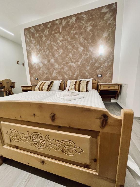 Postel nebo postele na pokoji v ubytování B&B L'Aigual
