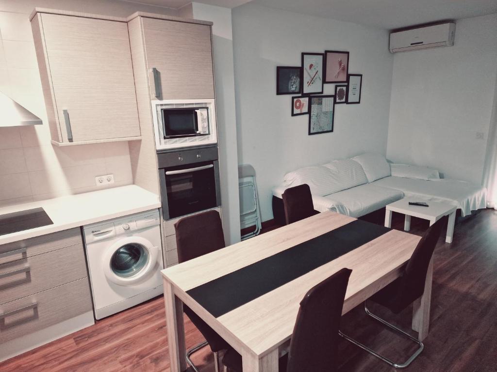 A kitchen or kitchenette at Luxury Apartments Puerto Valencia