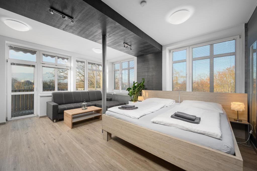 Postel nebo postele na pokoji v ubytování Apartmá SunGarden Liberec