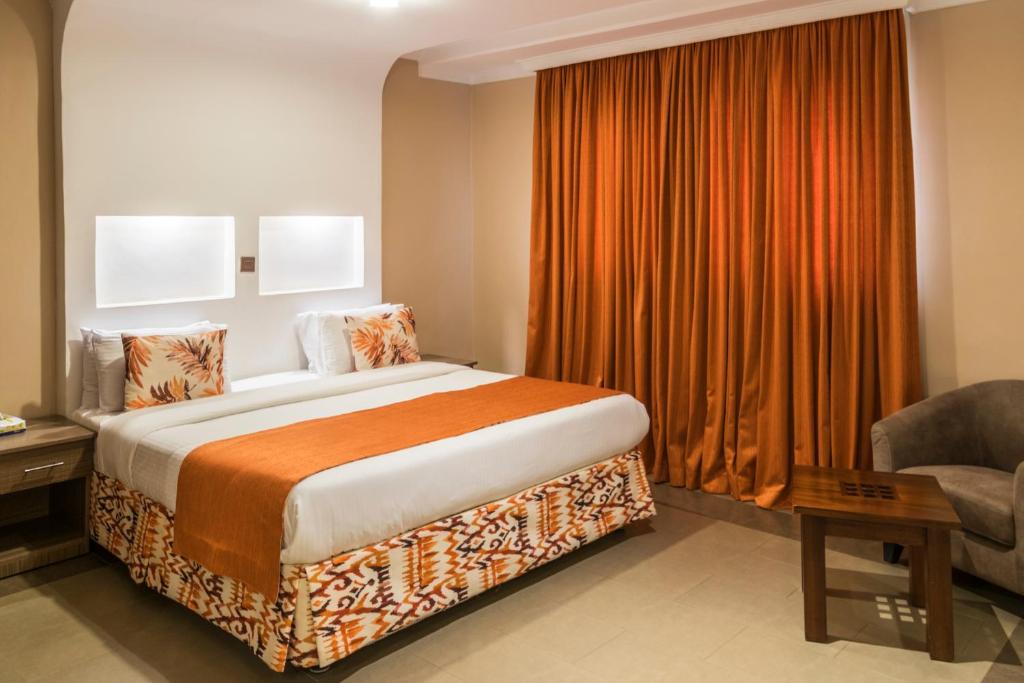 Postel nebo postele na pokoji v ubytování Hotel Waterbuck