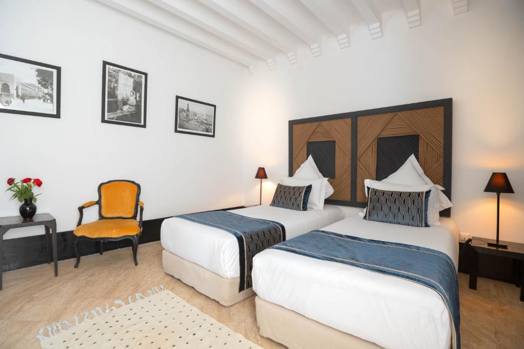 Postel nebo postele na pokoji v ubytování Riad & Spa Azzouz