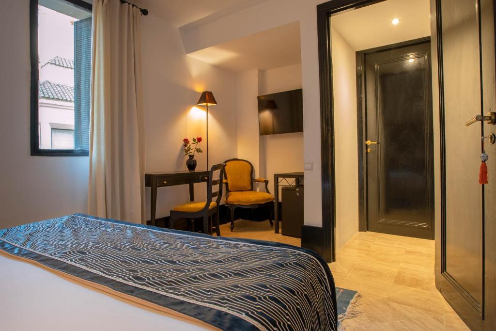 Postel nebo postele na pokoji v ubytování Riad & Spa Azzouz