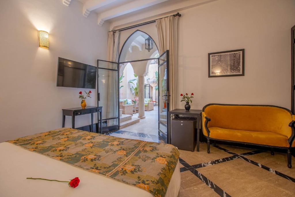 Postel nebo postele na pokoji v ubytování Riad & Spa Azzouz