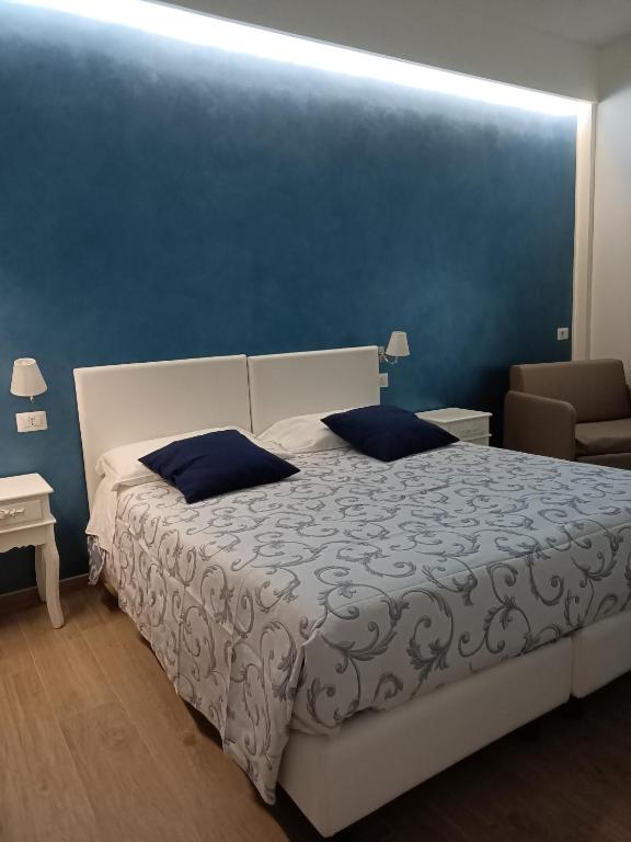 Łóżko lub łóżka w pokoju w obiekcie PVrooms