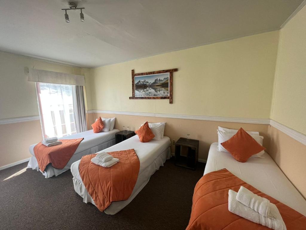 Postel nebo postele na pokoji v ubytování Darwin Hotel