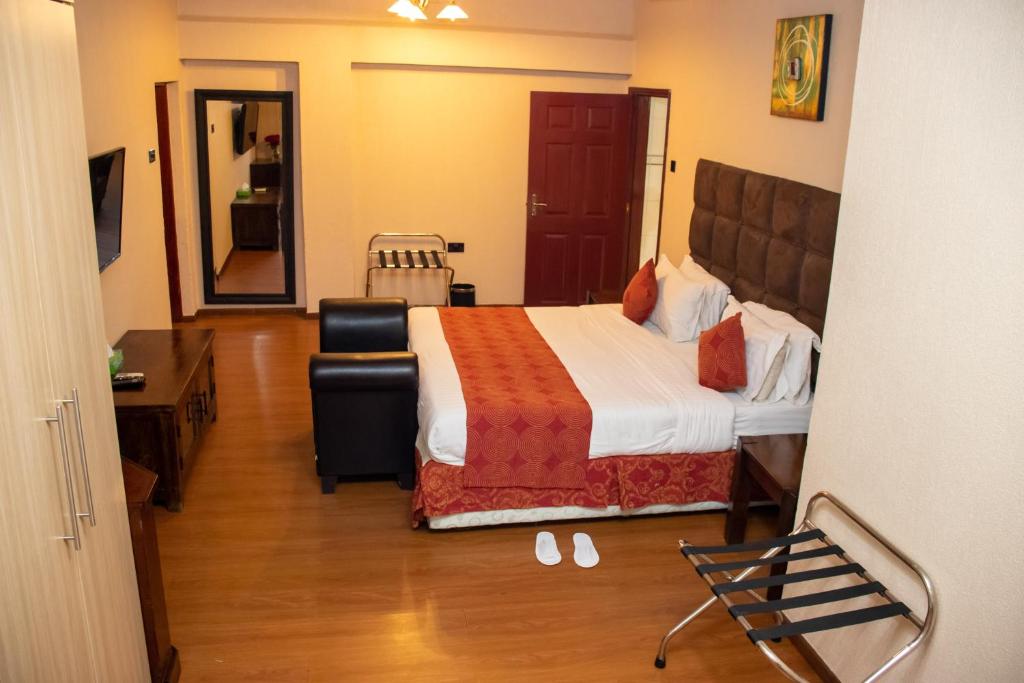 Postel nebo postele na pokoji v ubytování Hotel Waterbuck