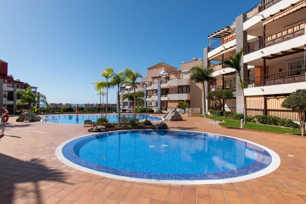 Bazén v ubytování Deluxe Villa Tenerife Los Cristianos nebo v jeho okolí