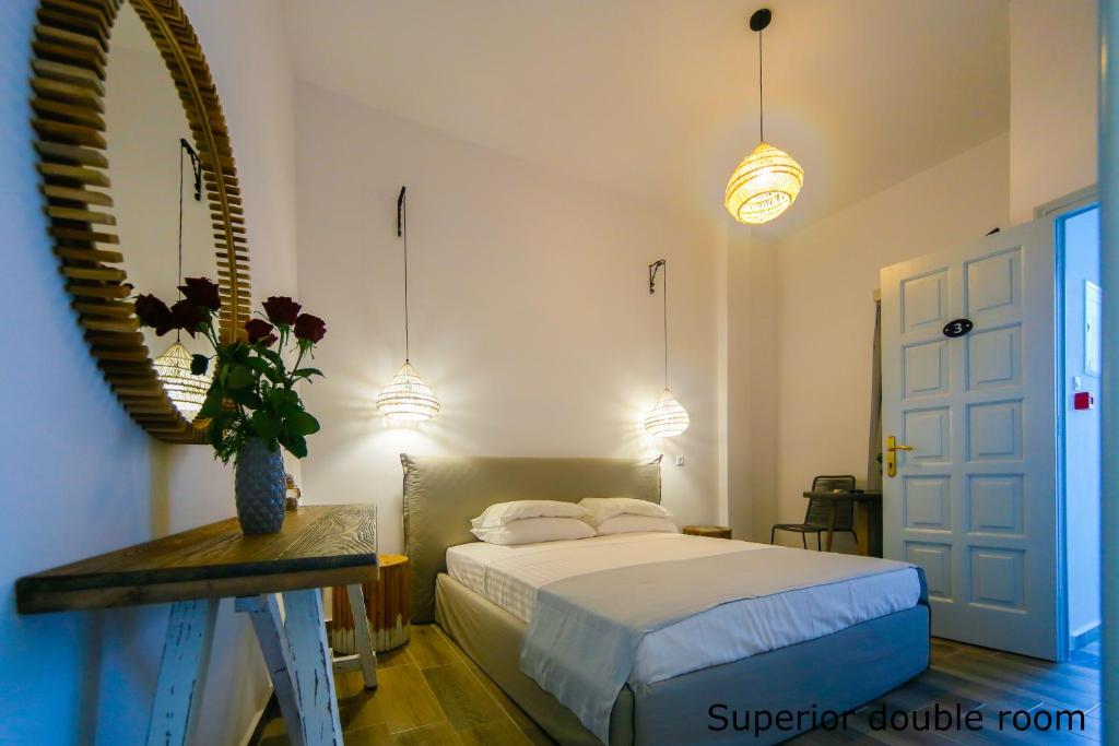 Postel nebo postele na pokoji v ubytování St. Paul's Bay View Suites