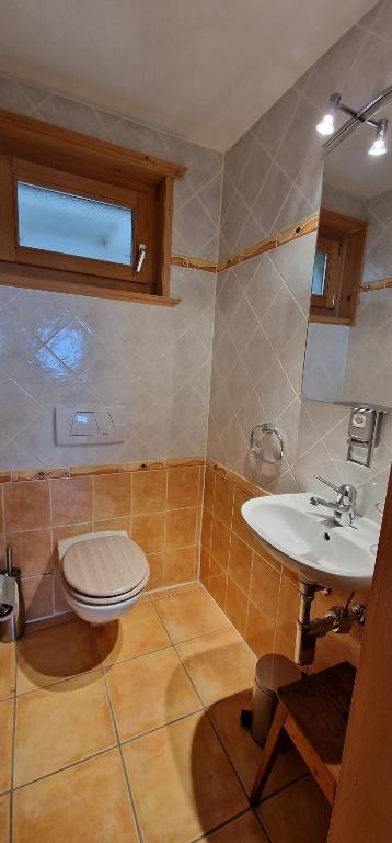 Koupelna v ubytování Chalet Casteol