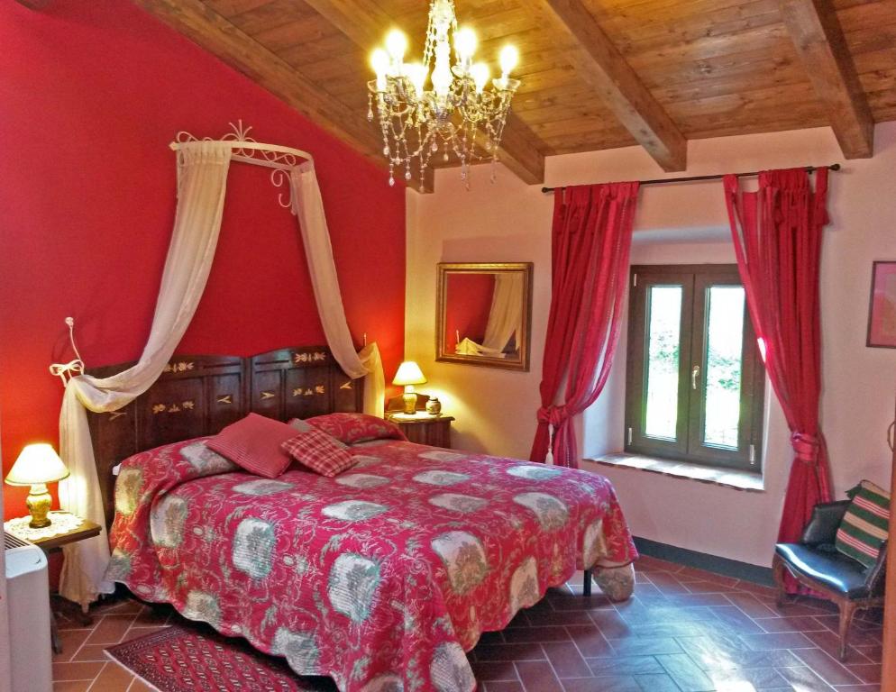 Łóżko lub łóżka w pokoju w obiekcie Locanda Le Panche