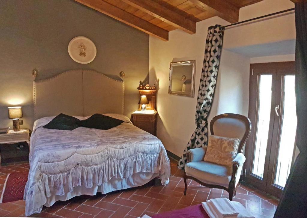 Łóżko lub łóżka w pokoju w obiekcie Locanda Le Panche