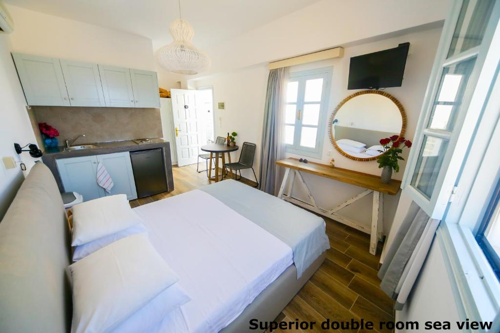 Postel nebo postele na pokoji v ubytování St. Paul's Bay View Suites