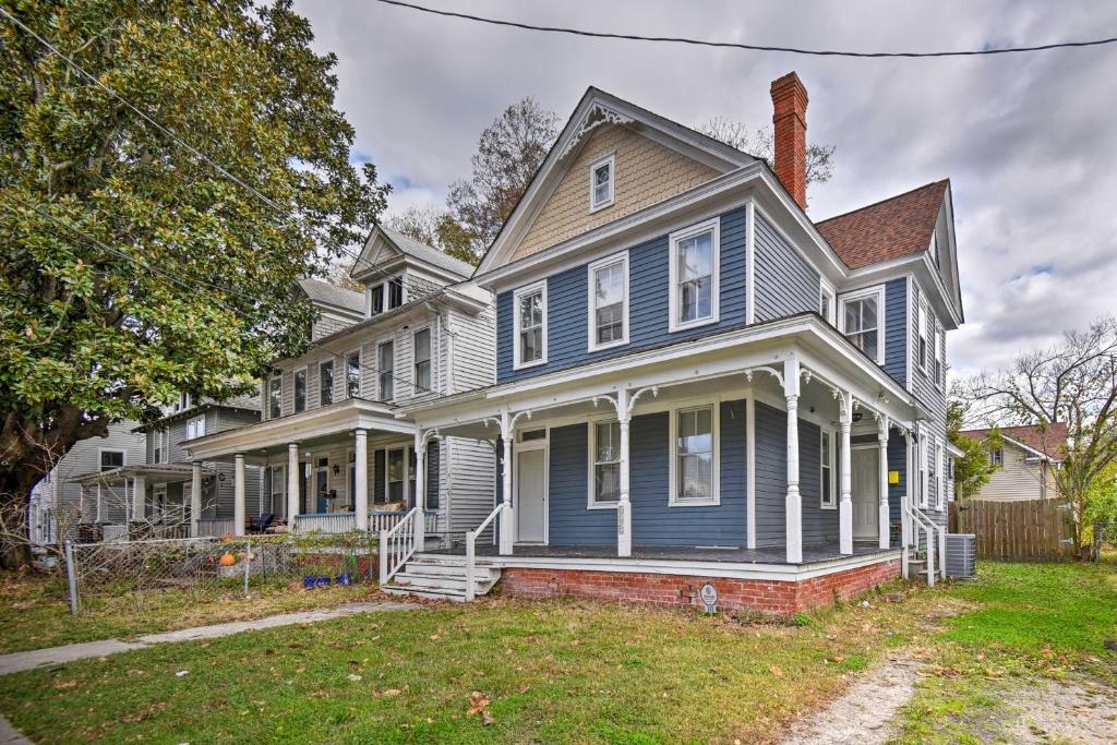 a large blue house with a porch at Cozy Portsmouth Studio about 3 Mi to Old Towne in Portsmouth
