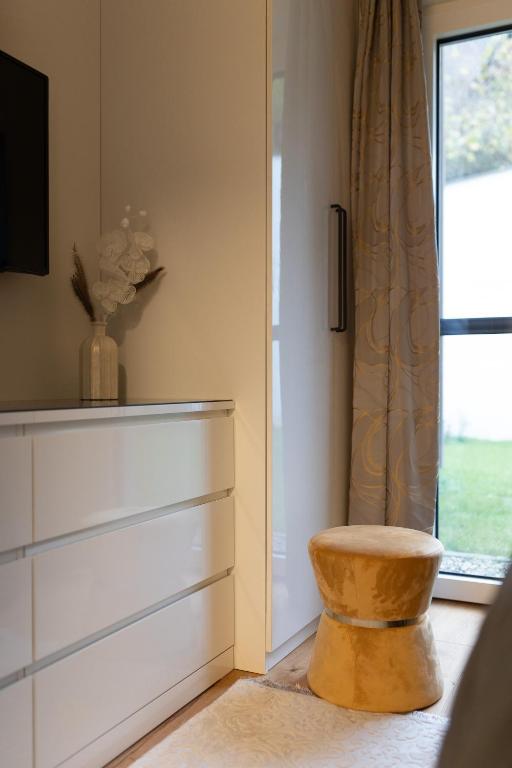 TV a/nebo společenská místnost v ubytování Ferienwohnung Deluxe Sattendorf