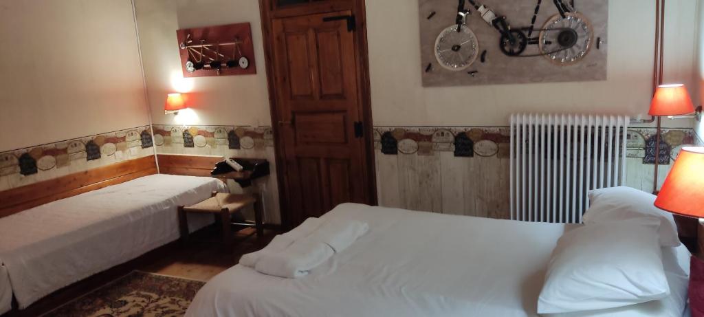 Łóżko lub łóżka w pokoju w obiekcie Guesthouse Kazakou