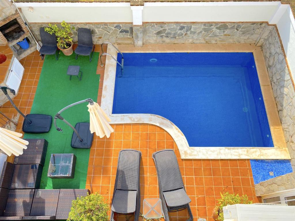Bazén v ubytování Villa Mirto Private Pool Casasol nebo v jeho okolí