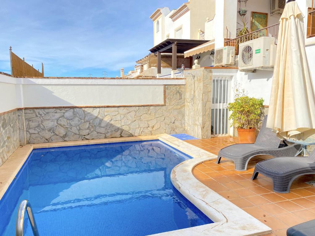 Bazén v ubytování Villa Mirto Private Pool Casasol nebo v jeho okolí