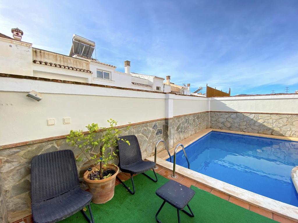 Bazén v ubytování Villa Mirto Private Pool Casasol nebo v jeho okolí
