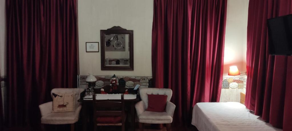 Łóżko lub łóżka w pokoju w obiekcie Guesthouse Kazakou