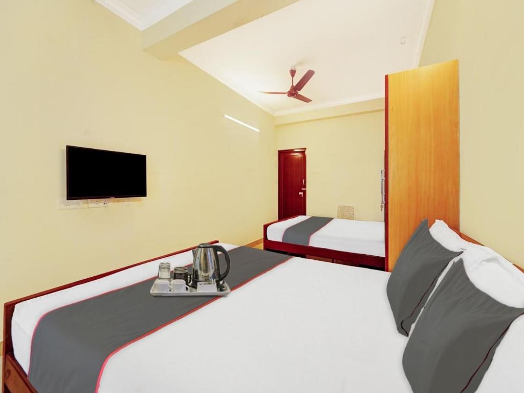 Postel nebo postele na pokoji v ubytování KS RESIDENCY