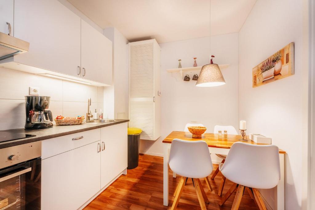 Kuchyň nebo kuchyňský kout v ubytování Harz Cottage Braunlage