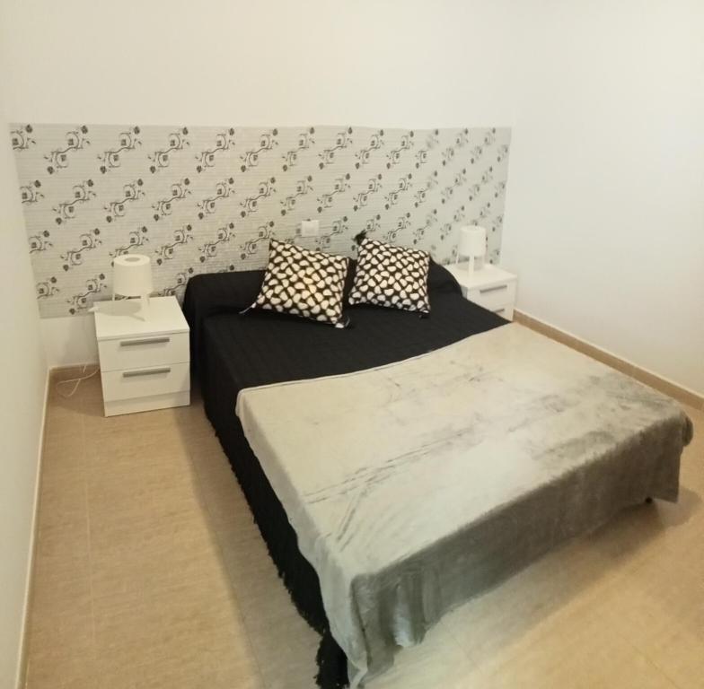 Posteľ alebo postele v izbe v ubytovaní Casa Analiz