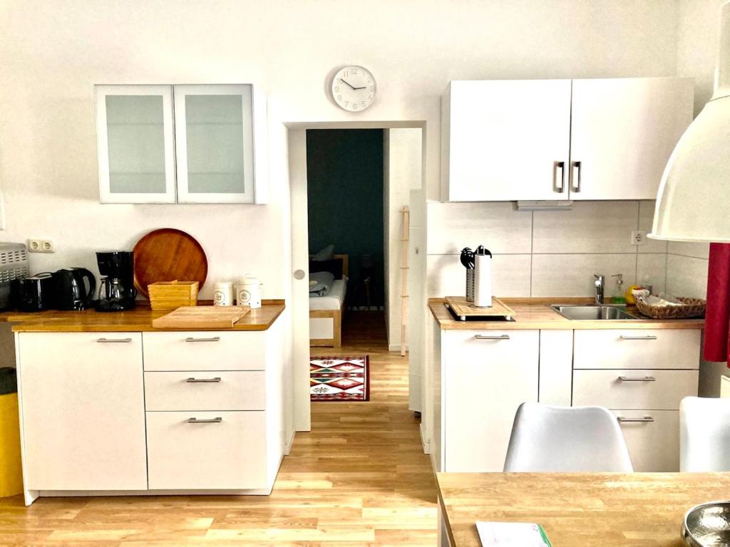 Kuchyň nebo kuchyňský kout v ubytování Harz Cottage Braunlage