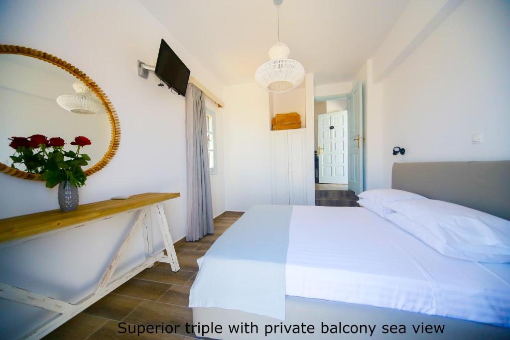 Postel nebo postele na pokoji v ubytování St. Paul's Bay View Suites